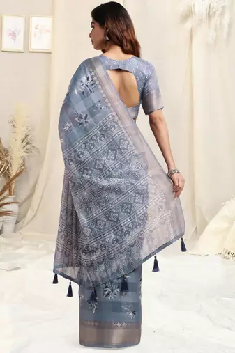 Light blue cotton floral print ajrakh print golden zari border tassels saree with unstitched blouse piece