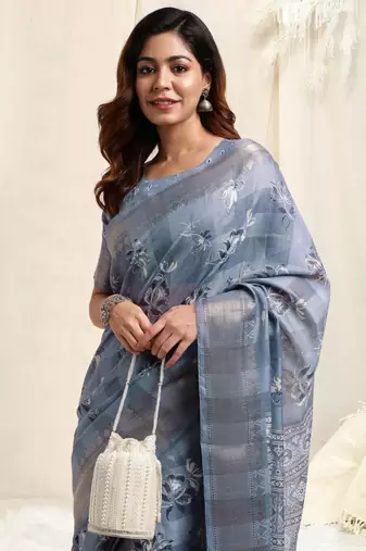 Light blue cotton floral print ajrakh print golden zari border tassels saree with unstitched blouse piece
