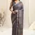 Dusty purple cotton blend floral print golden zari border tassels saree with unstitched blouse piece