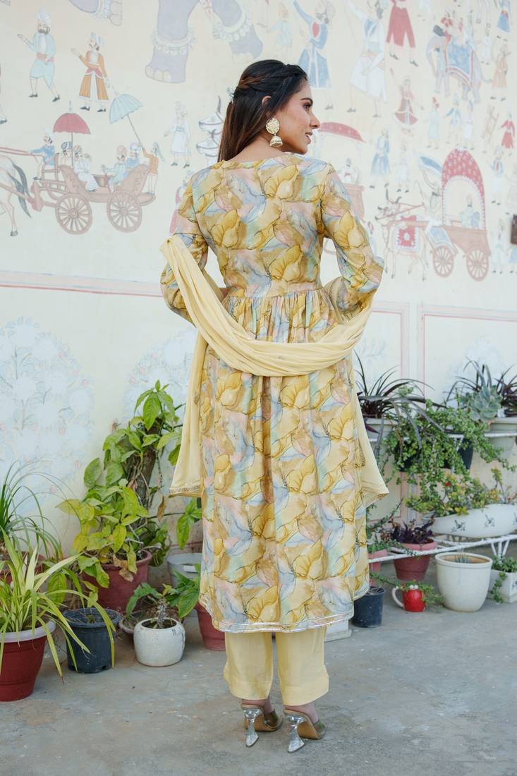 Women yellow muslin embroidered kurta  pant & dupatta set