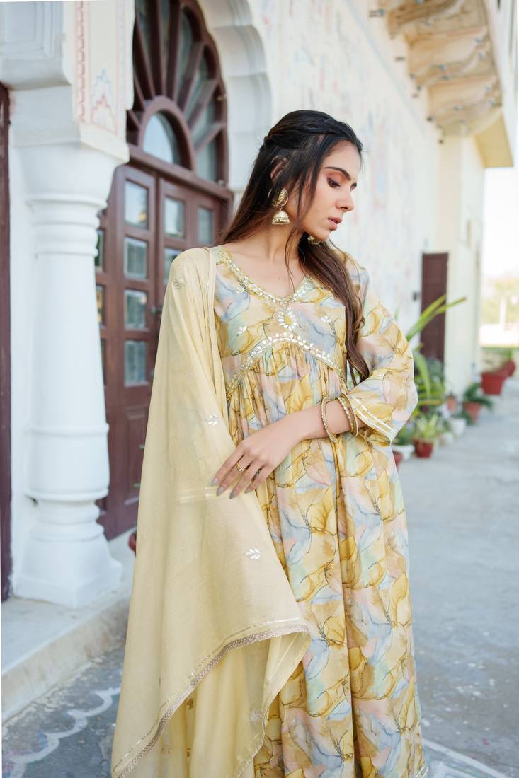 Women yellow muslin embroidered kurta  pant & dupatta set