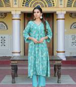 Women aqua muslin pleated kurta & pant clothing set