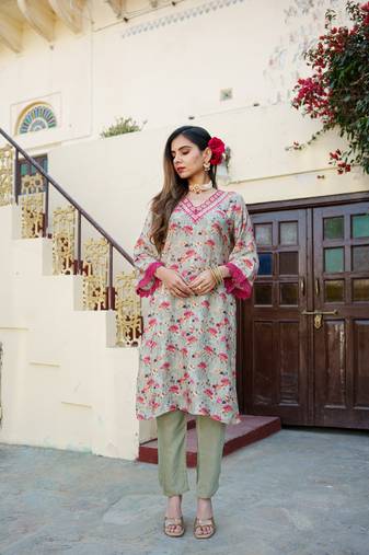Women pista green muslin embroidered kurta & pant set