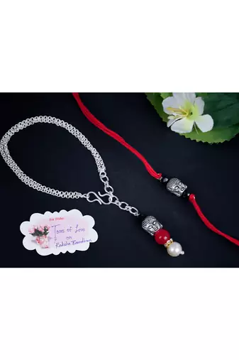 Red Cotton Dori Silver Plated Buddha Design Rakhi Combo