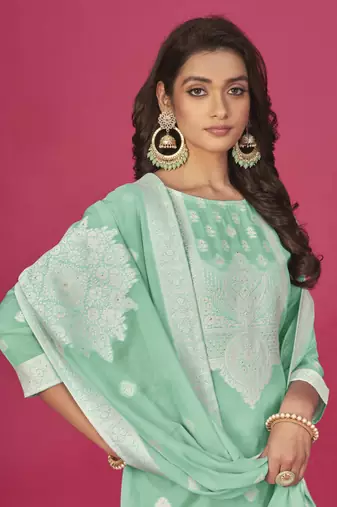 Sea geen colour organza suit for trendy girlish party looks with resham work
