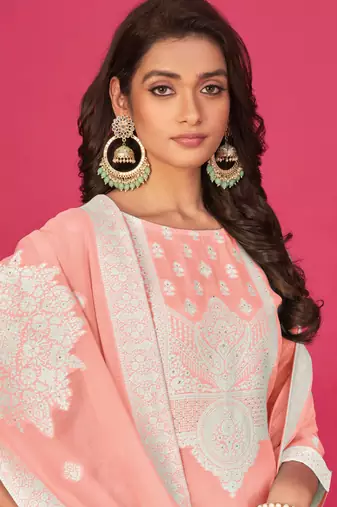 Peach colour organza suit for trendy girlish party looks with resham work