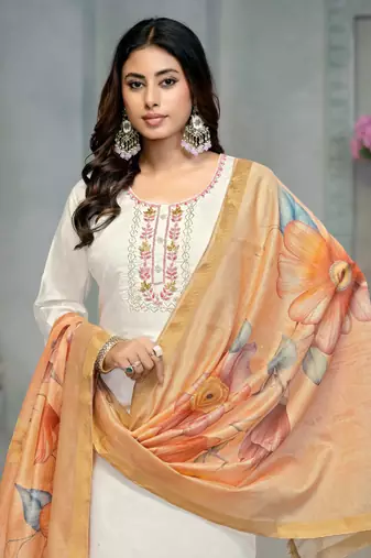 Beautiful cream colour rayon cotton readymade suit with graceful embroidery work for ethnic party looks