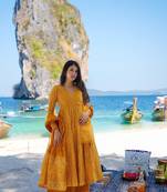 Heavy and ethnic graceful looks mustard colour palazzo dress for partywear looks