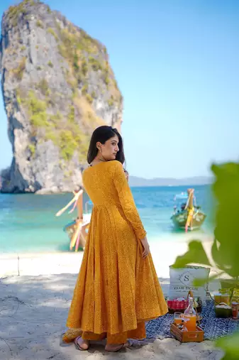 Heavy and ethnic graceful looks mustard colour palazzo dress for partywear looks