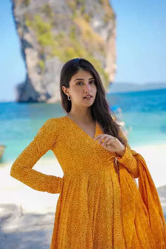 Heavy and ethnic graceful looks mustard colour palazzo dress for partywear looks