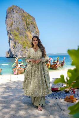 Heavy and ethnic graceful looks green colour palazzo dress for partywear looks 1