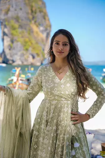 Heavy and ethnic graceful looks green colour palazzo dress for partywear looks