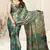 Teal brasso leaf print floral print saree with unstitched blouse piece