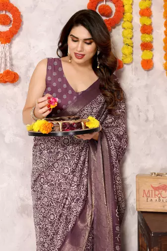 Dusty pink silk blend floral print zari woven border saree with unstitched blouse piece