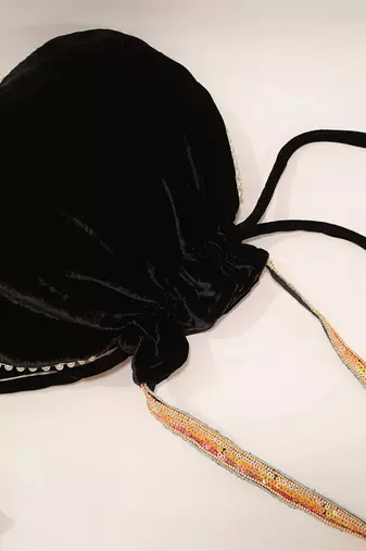Women's embellished potli hand bag with multi color sequins beaded work