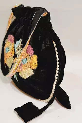 Women's embellished potli hand bag with multi color sequins beaded work