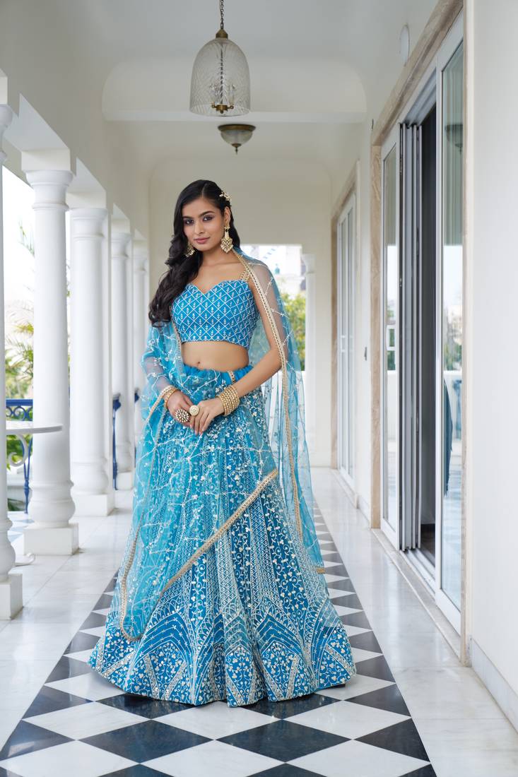 Glamorous Sky Blue Butterfly Net With Thread And Sequence Embroidered Work Lehenga Choli For Wedding