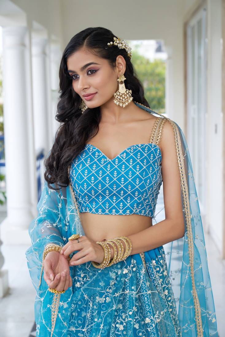 Glamorous Sky Blue Butterfly Net With Thread And Sequence Embroidered Work Lehenga Choli For Wedding