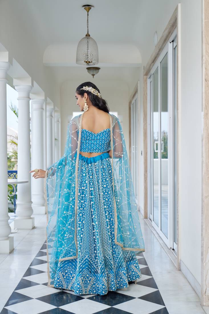 Glamorous Sky Blue Butterfly Net With Thread And Sequence Embroidered Work Lehenga Choli For Wedding