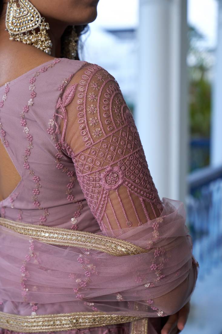 Glamorous Dusty Pink Butterfly Net With Tone To Tone Thread And Sequence Embroidered Work Lehenga Choli For Wedding