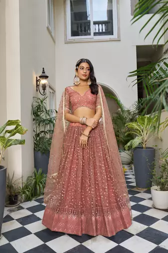 Glamorous Rust Butterfly Net With Tone To Tone Thread And Sequence Embroidered Work Lehenga Choli For Wedding