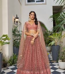Glamorous Rust Butterfly Net With Tone To Tone Thread And Sequence Embroidered Work Lehenga Choli For Wedding