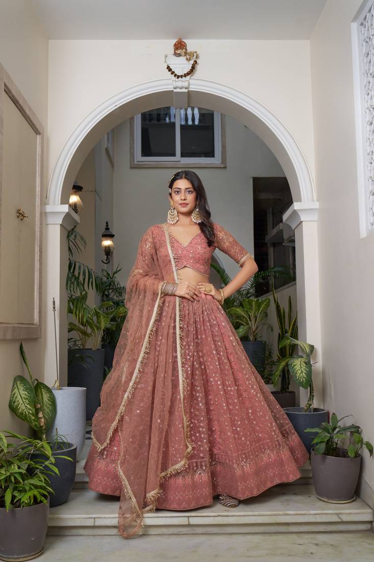 Glamorous Rust Butterfly Net With Tone To Tone Thread And Sequence Embroidered Work Lehenga Choli For Wedding