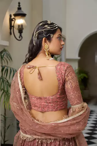 Glamorous Rust Butterfly Net With Tone To Tone Thread And Sequence Embroidered Work Lehenga Choli For Wedding
