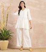 Off-white herringbone v-neck peplum top and flared trouser set