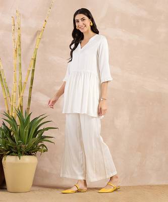 Off-white herringbone v-neck peplum top and flared trouser set 2