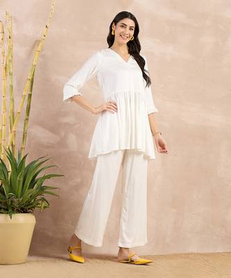 Off-white herringbone v-neck peplum top and flared trouser set 3