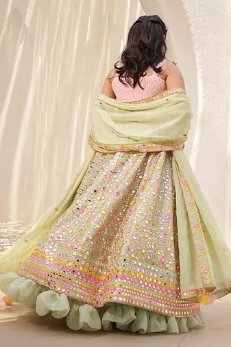 Green embroidered choli with lehenga