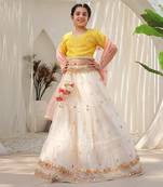 Yellow mirror embroidered choli with lehenga