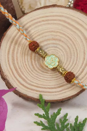 Fancy om combo rakhi with roli chawal & rakshabandhan card|best gift for men/bro/brother 