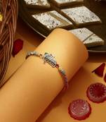 Silver Plated Krishna Thread Rakhi with Kum-Kum Chawal