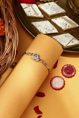 Silver Plated Pecaock Thread Rakhi with Kumkum & Chawal 1
