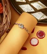 Silver Plated Pecaock Thread Rakhi with Kumkum & Chawal