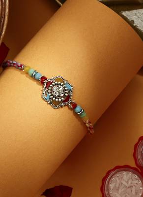 Multicolour Flower Shaped Thread Rakhi with Kumkum & Chawal 2
