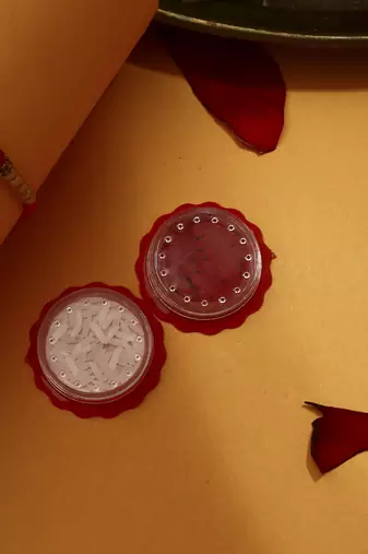 Red Meenakari Flower Thread Rakhi with Kumkum & Chawal