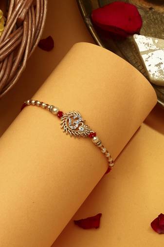 Om rakhi with american stone studs