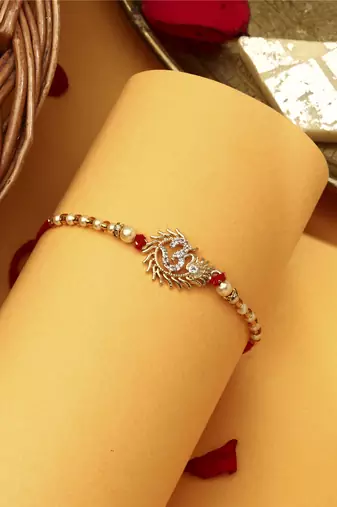 Om rakhi with american stone studs
