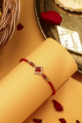 Red & white american stone studded rakhi
