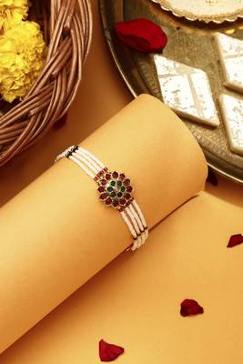 Red & green stone studded flower pearl rakhi bracelet 1