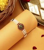 Red & green stone studded flower pearl rakhi bracelet