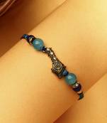 Peacock feather rakhi