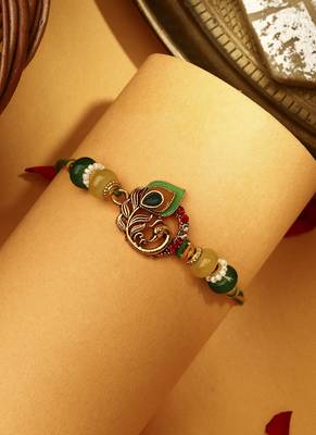 Peacock rakhi with meenakari work 1