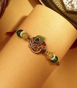 Peacock rakhi with meenakari work