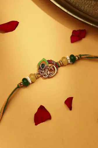 Peacock rakhi with meenakari work