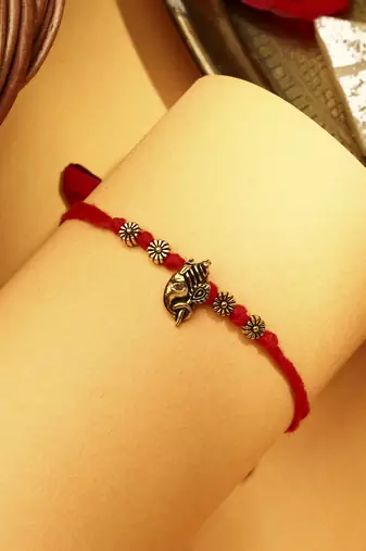Ganesh motif rakhi