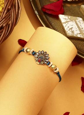 Peacock rakhi with kundan stones 1